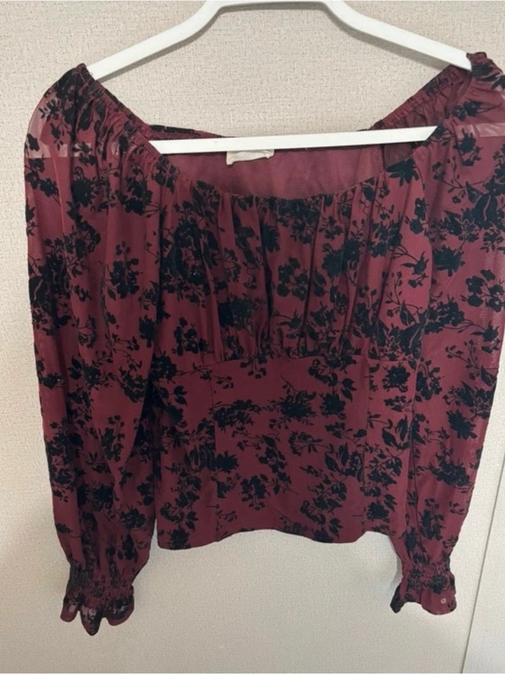 Off-Shoulder Burgundy Floral Blouse with Black Print